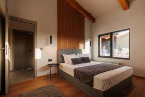 Ένα ή περισσότερα κρεβάτια σε δωμάτιο στο Local Stay Villas +65 φωτογραφίες