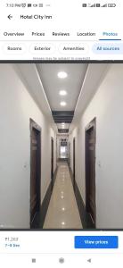 a screenshot of a hallway in a building at Hotel City inn in Gaya