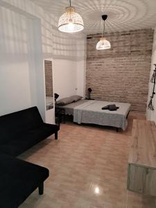 Katil atau katil-katil dalam bilik di LIAM STUDIO IN SEVILLA CENTRIC