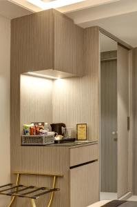Kuchyň nebo kuchyňský kout v ubytování Stepstones Hotels and Inn-DLF PHASE 3 GURGAON