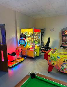 a play room with a pool table and a game at Sheepy village Leysdown in Leysdown-on-Sea