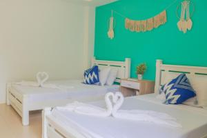 Ένα ή περισσότερα κρεβάτια σε δωμάτιο στο DOWNTOWN RESORT SANTA FE +22 φωτογραφίες