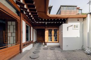 an external view of a house with a courtyard at Luxury hanok with private bathtub -SN15 in Seoul