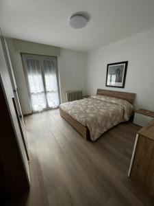 Postel nebo postele na pokoji v ubytování Appartamento G.A.