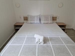 Postel nebo postele na pokoji v ubytování Sky Rooms 1