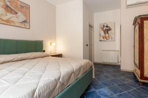 Postel nebo postele na pokoji v ubytování B&B Dimora di Girgenti