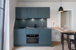 Küche/Küchenzeile in der Unterkunft Komfort-Apartement 13