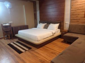 Ένα ή περισσότερα κρεβάτια σε δωμάτιο στο The Palash Vann Pench