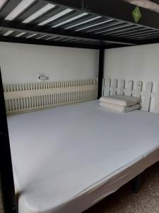 Ein Bett oder Betten in einem Zimmer der Unterkunft Apartamento Coral con vistas al mar