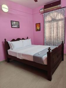Ένα ή περισσότερα κρεβάτια σε δωμάτιο στο Villa Cherie