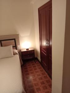 A bed or beds in a room at Habitacion matrimonial centro ciudad