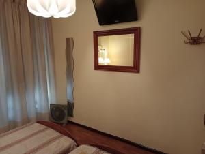 A bed or beds in a room at Habitacion matrimonial centro ciudad