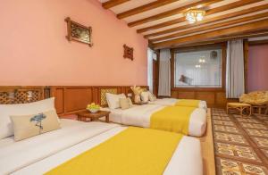 Frida's Inn 丽江梦之旅观景客栈客房内的一张或多张床位