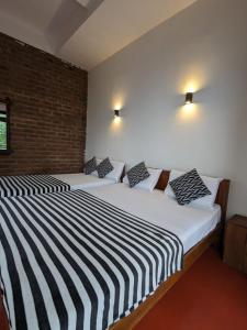 Ліжко або ліжка в номері Diduli Hotel
