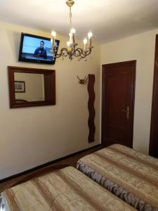 A bed or beds in a room at Habitacion matrimonial centro ciudad