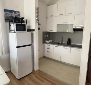 Kuchyň nebo kuchyňský kout v ubytování Apartmani Pag Luxury 4U
