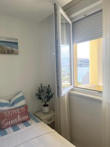 Postel nebo postele na pokoji v ubytování Apartmani Pag Luxury 4U