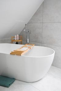 Phòng tắm tại Haus Morgengau Familienzeit und Wellness +39 ảnh