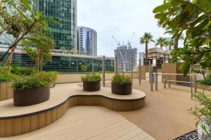 a view of a city skyline with tall buildings at Luxury Redefined in AHAD Residence by Suiteable in Dubai