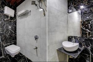 ムンバイにあるHotel New Blue Sapphire Residencyのバスルーム(トイレ、洗面台、シャワー付)