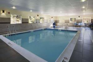 a large swimming pool in a hotel room at Microtel Inn & Suites Wilkes-Barre in Wilkes-Barre