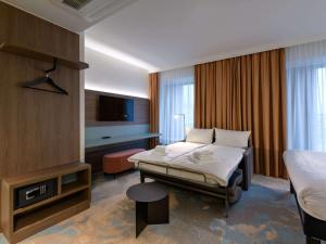 Postel nebo postele na pokoji v ubytování ibis Styles Kiel City