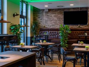 TV a/nebo společenská místnost v ubytování ibis Styles Kiel City