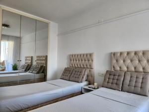 Ένα ή περισσότερα κρεβάτια σε δωμάτιο στο CASABLANCA DUPLEX apartamentos +41 φωτογραφίες