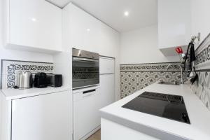 Kuchyň nebo kuchyňský kout v ubytování Aspasios Charming Flats