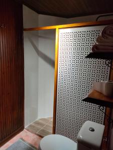 a bathroom with a toilet and a shower at Chalet's lake_Bolu Abant _log house in Piroğlu