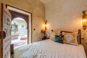 Postel nebo postele na pokoji v ubytování Riad La Fayette Bed & Breakfast