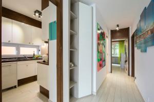 Köök või kööginurk majutusasutuses Melide Apartments - Happy Rentals