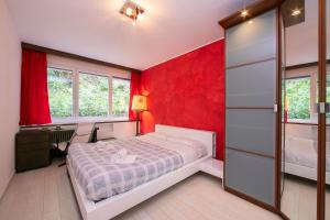 Voodi või voodid majutusasutuse Melide Apartments - Happy Rentals toas