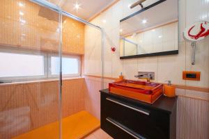 Vannituba majutusasutuses Melide Apartments - Happy Rentals