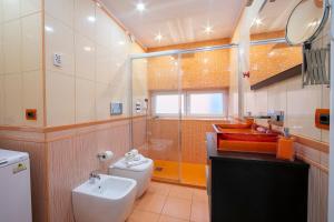 Vannituba majutusasutuses Melide Apartments - Happy Rentals