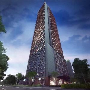 a tall building with a pyramid at The Scarletz By RSR in Kuala Lumpur