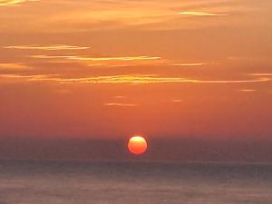The sunrise or sunset as seen from Az apartmant or nearby