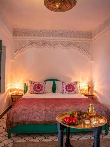 Postel nebo postele na pokoji v ubytování Riad dada Messouda spa