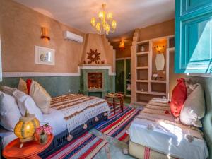 Postel nebo postele na pokoji v ubytování Riad dada Messouda spa