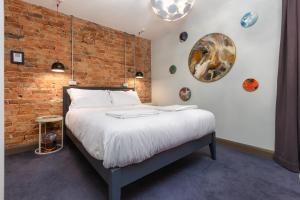 Кровать или кровати в номере ART B&B