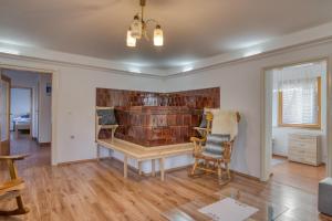 a home office with a desk and a chair at Farmhouse Blackberry Pool & Wellness- Happy Rentals in Vransko