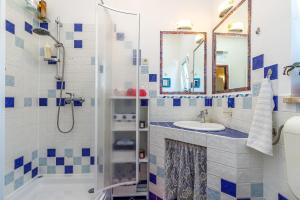a bathroom with a shower and a sink at Cozy Home with Private Garden - Happy Rentals in Dražice +23 photos
