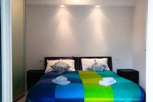 Ліжко або ліжка в номері Appartamento a Santa Margherita con terrazzo