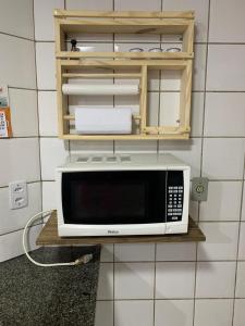 Dapur atau dapur kecil di Encanto Guarapari