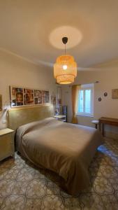 Ένα ή περισσότερα κρεβάτια σε δωμάτιο στο Guest House Le Arti Minori