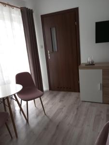 TV a/nebo společenská místnost v ubytování Noclegi U Janusza - Bieszczady