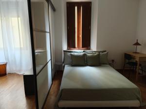 Letto o letti in una camera di Fluère - Via Riva Reno