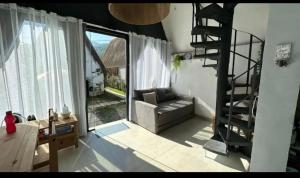 Posezení v ubytování Barra do Una Chalé