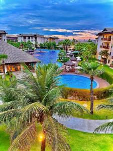 an aerial view of a resort with a swimming pool at VG Sun Cumbuco 406 in Cumbuco