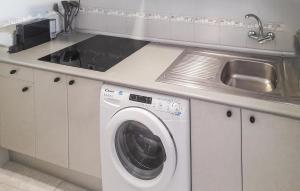 A kitchen or kitchenette at Pet Friendly Apartment